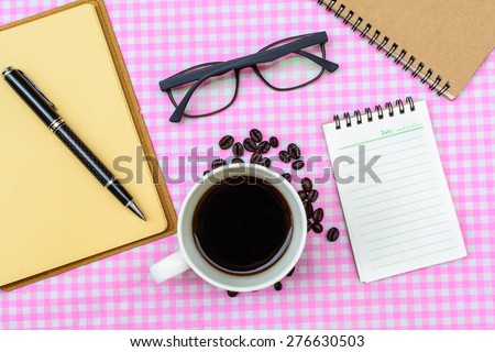 Blank note book with cup of coffee, Vintage style