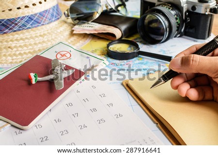 Diary and calendar with passport, Travel concept
