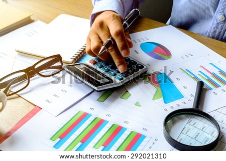 businessman working on Desk office business financial accounting calculate, Graph analysis