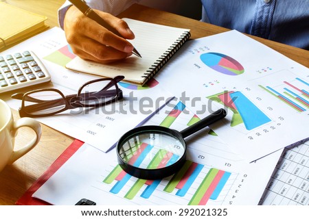 businessman working on Desk office business financial accounting calculate, Graph analysis