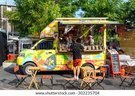 Bangkok, Thailand 25 - July,2015: People order meal from food trucks at Food Truck Fair in Bangkok.