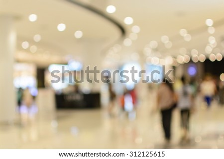 Abstract Blurred image of people in shopping mall, Vintage tone