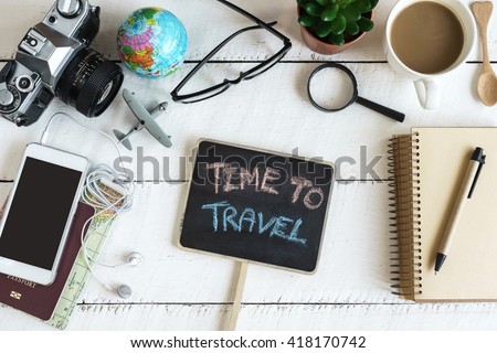 Outfit of traveler on white wooden background and copy space, Travel concept