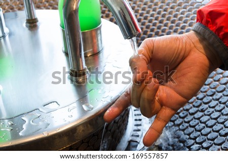 Washing hands with water, love symbol