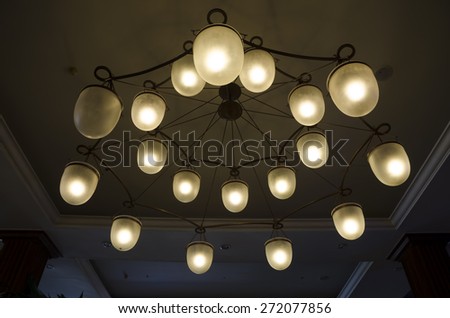 Lighting fixtures or chandelier on ceiling