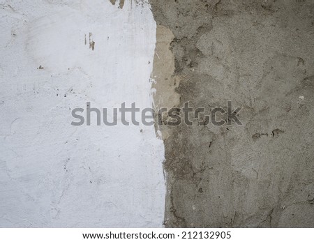white plastered walls and a cement wall