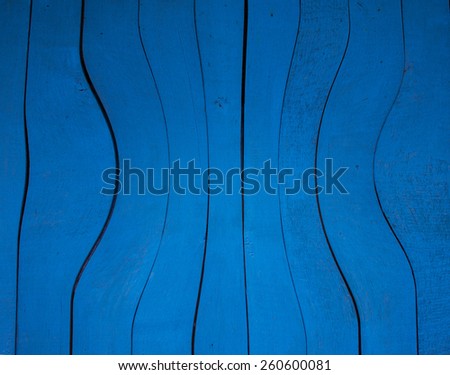 wooden fence with curved boards