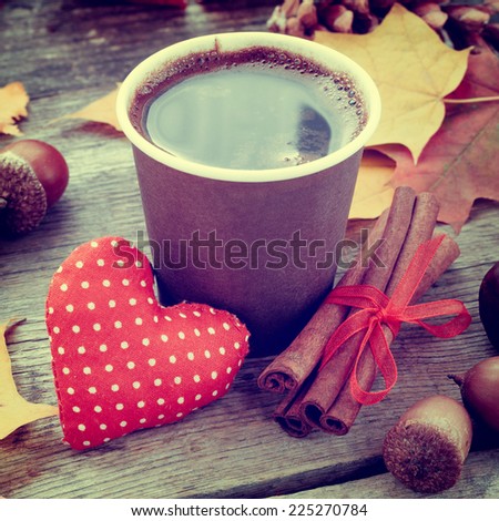coffee cup, red heart and autumn still life on old table