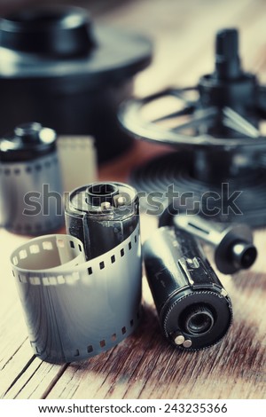 Old photo film rolls, cassette and photographic equipment. Vintage stylized.