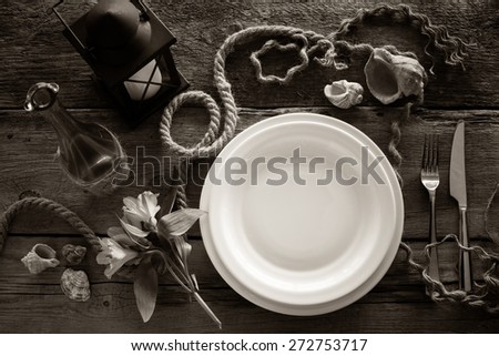 Table setting in retro style, top view. Black and white stylized.