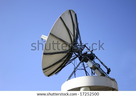 Side shot of a television broadcasting satellite dish
