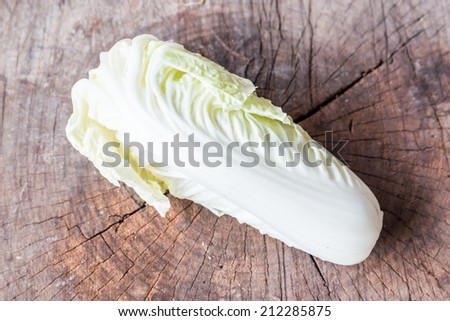 heart of romaine lettuce on a rustic wooden board