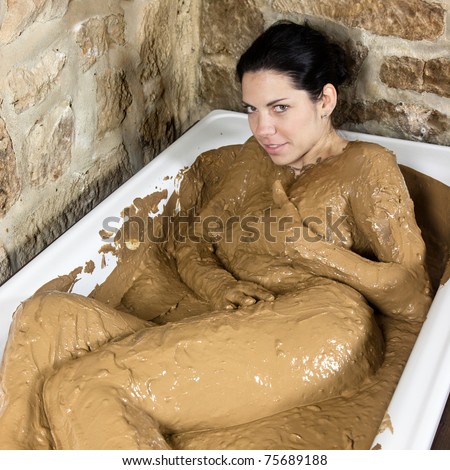 Woman in bath with clay - Health with Healing Earth