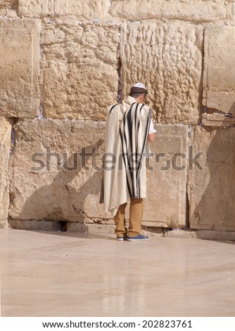 Praying at Western Wall