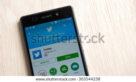 Petaling Jaya, Malaysia - Aug 6, 2015: Twitter mobile app in Google Play Store on mobile phone. Twitter has mobile apps for iPhone, iPad, Android, Windows Phone, BlackBerry, Firefox OS, and Nokia S40.
