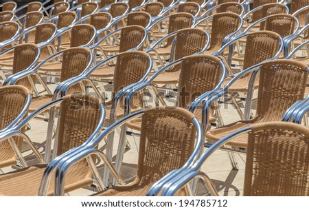 Rows of chairs prepared for outdoor event