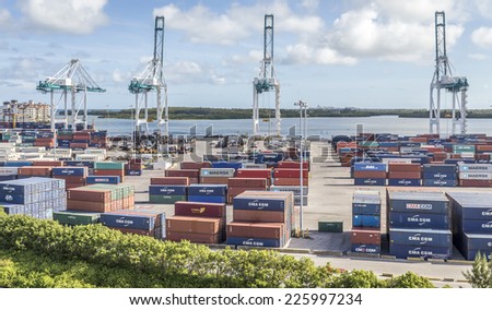 MIAMI, USA - SEPTEMBER 06, 2014 : The Port of Miami with containers and cranes on the background on September 06, 2014 in Miami.