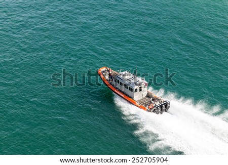 MIAMI, USA - SEPTEMBER 06, 2014 : Coast guard boat near Miami port on September 06, 2014 in Miami.