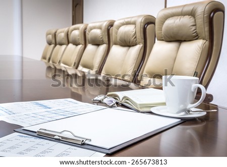 Business papers in conference room before meeting in office