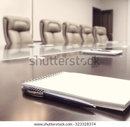 Conference room before meeting, beige toning
