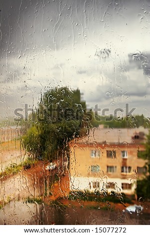 Summer. Weather and spoil a thunderstorm started. Heavy rain outside the window.