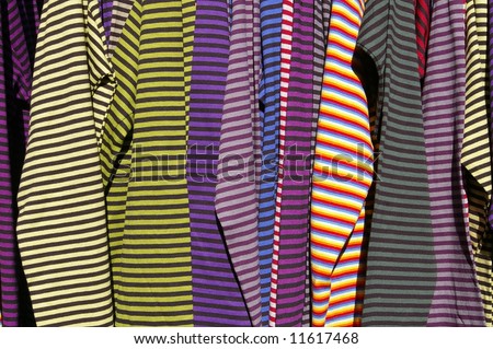 Some shirts exposed in laterally. With its bright colors. Stripe