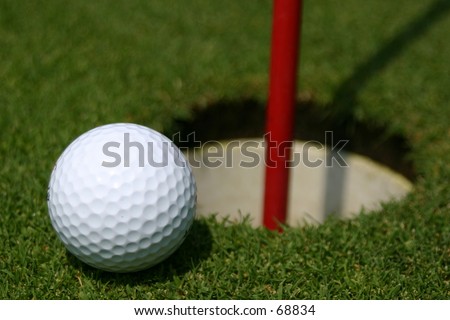 Golf Ball and Practice Putting Hole