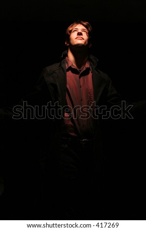 Strange man lookes into the light
