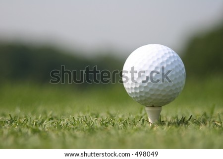 Golf Ball on Tee at real Golf Course
