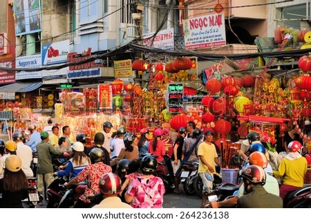 HO CHI MINH CITY, VIETNAM - 16 Feb 2015 Sai Gon city center Lucky charm items in red and gold are for sale before lunar new year, called Tet in Vietnam, derived from the Chinese New year tradition