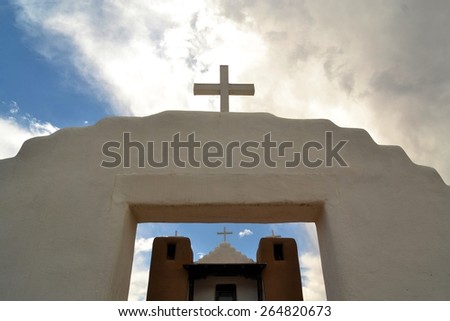 Little Christian church in Taos Pueblo ancient Indian indegineous adobe city in New Mexico