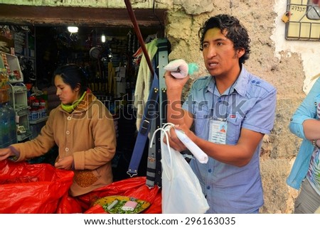 Potosi, Bolivia - 24 November 2012: Dynamite is a big help for miners and is sold at the miner's market in Potosi. Potosi is one of the highest cities in the world and nearby Cerro Rico has a long