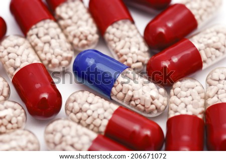 Blue Pill and Red Pills isolated on white
