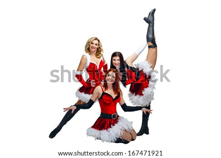 Attractive young dancers in Christmas costume isolated on white background