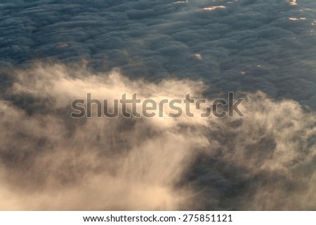 View of clouds from the window of a jet aircraft. Concept travel.