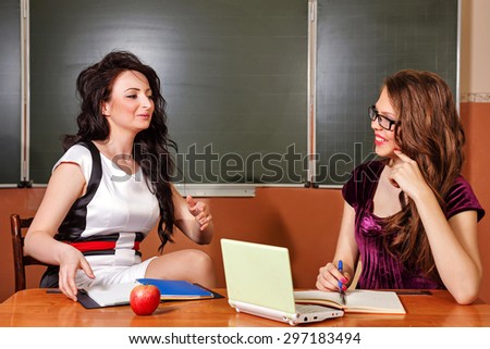 The teacher conducts individual session with a student. The concept of modern education. Back to school.