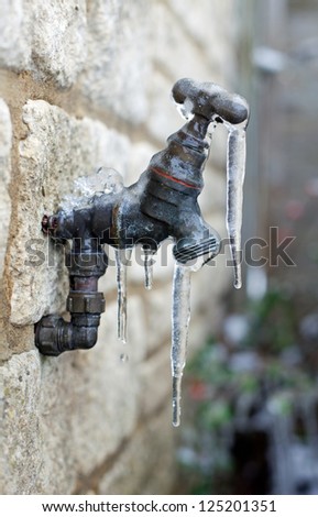 Old frozen water tap