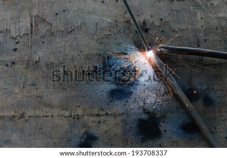 welder Welding Sparks  steel in factory