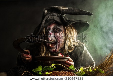 Witch holds a sickle and a plate with eyes in her hands