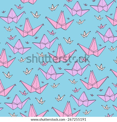 pink origami birds pattern on a blue background