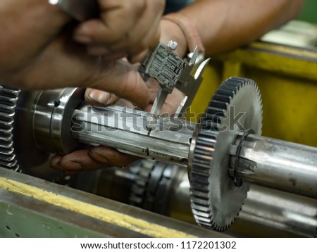 Preventive machine maintenance and retrofit in machine shop.