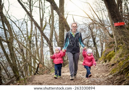 Family in hiking in the mountains. Family recreation.