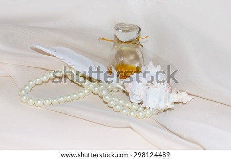 Vintage Perfume Bottle with feather, pearls and shellfish