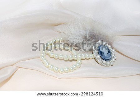 Vintage cameo with fur and pearls