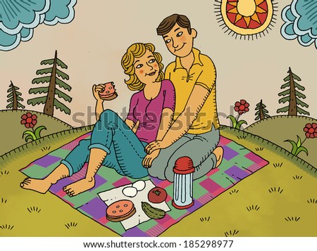 happy couple sitting on a picnic