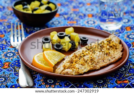 mackerel with garlic and lemon marinated. Moroccan dish. tinting. selective focus