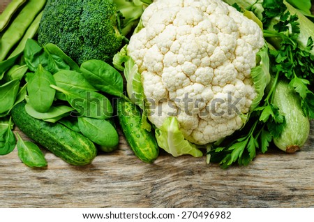 green vegetables. zucchini, cucumber, spinach, cauliflower, broccoli, parsley. the toning. selective focus