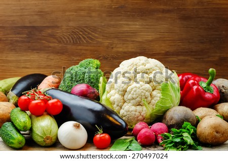 vegetables. tomatoes, potatoes, eggplant, zucchini, onion, carrot, radish, cucumber, tomato, peppers, spinach, cauliflower, broccoli, beets, parsley. the toning. selective focus