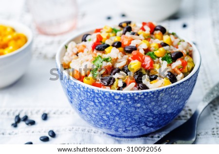 Lime black beans corn rice on a white background. the toning. selective focus