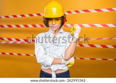 Young Woman with Toolbelt Gloves Level Safety Glasses